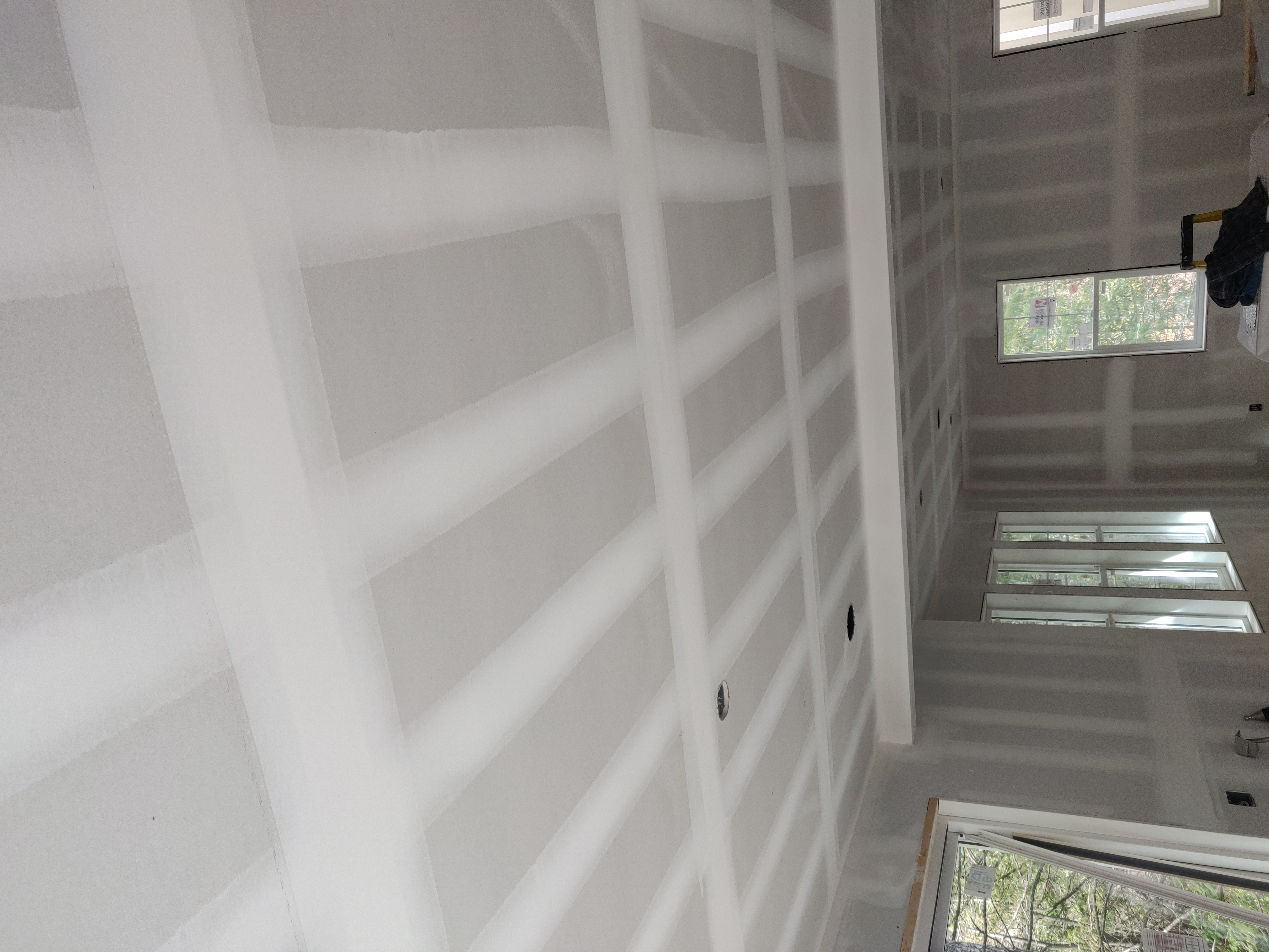 Finished drywall installation on a commercial interior